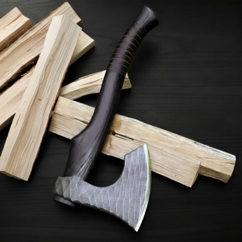 Hand forged Viking battle axe with sharp steel edge and wooden grip
