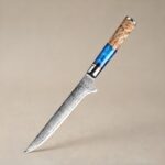 Monarch Damascus Boning Knife trimming and deboning meat