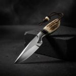 Close-up of the Damascus steel blade on a Custom Handmade Skinner Knife.