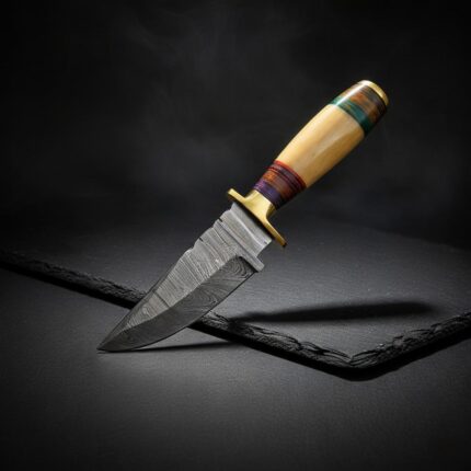 Fixed Blade Skinner Knife with a handcrafted leather sheath for hunting and camping.