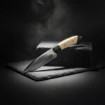 Razor Sharp Skinner Knife with a handcrafted leather sheath for hunting and camping.